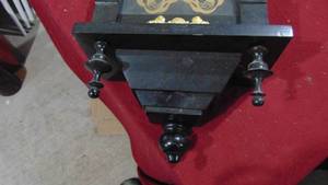 lot 123 image: Black Wall Clock with Brass Accents and Key