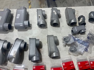 TABLE FULL OF ELECTRICAL ITEM