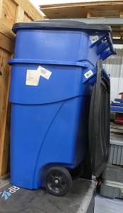 2 recycle baskets on wheels and with covers like new