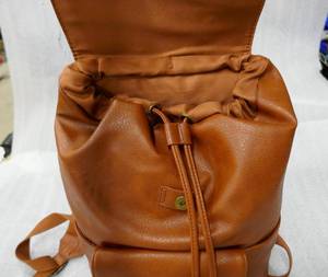 2 new travel backpacks brown and 2 new olive handbags