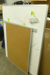white board and cork board