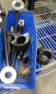 Bin full of work holding parts