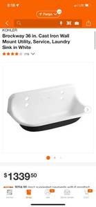 lot 53 image: KOHLER Brockway 36 in. Cast Iron Wall Mount Utility, Service, Laundry Sink in White ($1340 Retail Value) - There is some scuffing on the sink. Great Piece.
