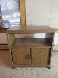 lot 101 image: Microwave Stand TV Stand on caster wheels