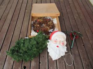 lot 142 image: Vintage Christmas Lot Christmas Tree Stand, Santa Light, Garland, Wreath in box.