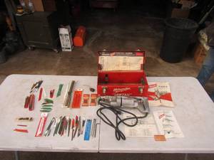 lot 230 image: Milwaukee Sawzall in case with Instructions, booklets, access.