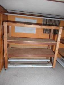 lot 309 image: Wood Storage Shelf on Casters.  74 W x 27 D x 64 Ht.