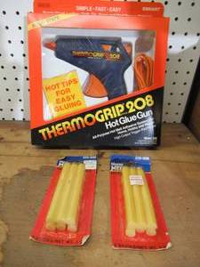 lot 359 image: New Old Stock. New in package Thermal Grip Glue Gun with new glue sticks. Model 208