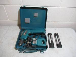 lot 370 image: Makita Drill in Metal Case with 2 Batteries and Charger. Model 610 HD