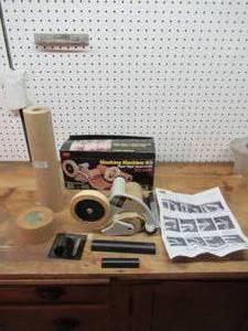 lot 374 image: Lot of Tape paraphernalia. New in Box Tape Dispenser.