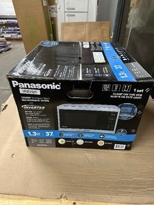 lot 22 image: Panasonic 1.3CuFt Stainless Steel Countertop Microwave Oven NN-SC668S - Customer Return Tested Works