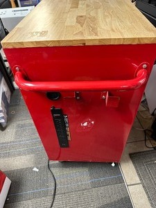 lot 25 image: Husky 42 in. W x 18.1 in. D 8-Drawer Red Mobile Workbench Cabinet with Solid Wood Top - Not Perfect