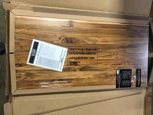 lot 16 image: HARDWOOD REFLECTIONS Solid Wood Butcher Block Shelf 24 in. W X 12in. D X 1.5in. H in Unfinished Acacia   Customer Returns See Pictures