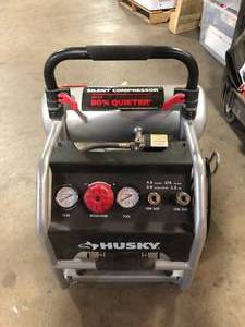 lot 29 image: Husky 4.5 Gal. Portable Electric-Powered Silent Air Compressor  Customer Returns See Pictures