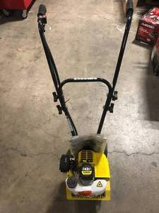 lot 32 image: Champion Power Equipment 9.5 in. Portable Gas Garden Tiller Cultivator Customer Returns See Pictures