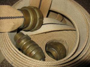 lot 185 image: WWII US Navy Fire Hose, Brass Fittings, 1943