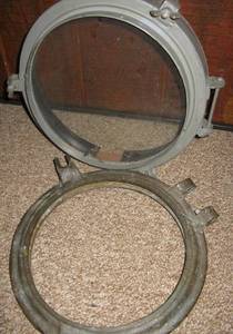 lot 199 image: WWII Era US Navy Porthole and Cover, 14 inches