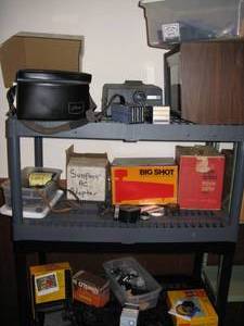 lot 251 image: HUGE Lot of Vintage Cameras, Flash Units, Bulbs, Lenses, Meters, Obsolete Film, etc