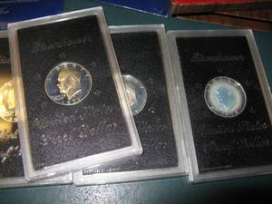 lot 298 image: 5 Eisenhower 40% Silver Proof Dollars and 2 Uncirculated Dollars