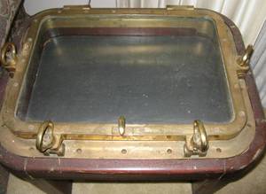 lot 19 image: Antique End Table Shadow Box Made from Ships Brass and Glass Porthole 