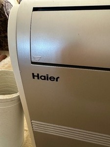 lot 98 image: Haier Air Conditioner with Remote