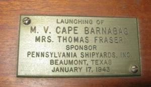 lot 86 image: Ship Launching Bottle in Wooden Case - M.V. Cape Barnabas 1943