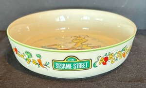 lot 75 image: Two Piece Gorham Sesame Street Childrens Bowl and Cup Set
