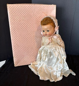 lot 79 image: Vintage American Character Doll with Clothing