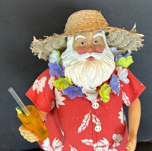 lot 88 image: Kurt Adler Fabriche Beach Santa Figurine