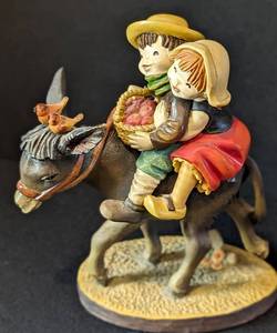 lot 28 image: Three Anri Italian Hand Carved Wood Figurines including Hand Carved Anri Wood Figurine Edelweiss Boy