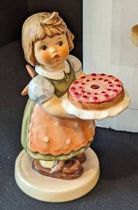 lot 29 image: Four Adorable Porcelain Hummel Figurines including Hummel Figurine Crossroads