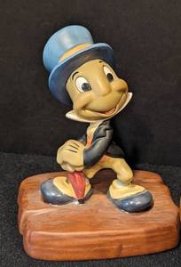 lot 152 image: Disney Pinocchio Music Box and Jiminy Cricket Figurine