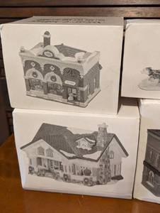 lot 181 image: Eight Department 56 Christmas Houses