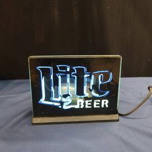 lot 16 image: MILLER LITE NEON SHELF LIGHT