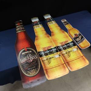 lot 46 image: 2 CARDBOARD MILLER DRAFT BEER POSTERS, 1 TIN MILLER DRAFT SIGN, 1 MICHELOB AMBER ROCK CARDBOARD POSTER