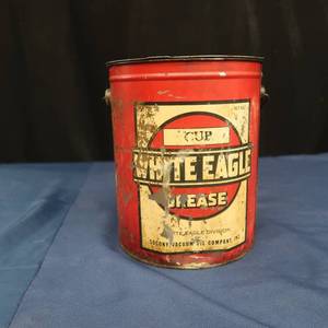 lot 57 image: WHITE EAGLE GREASE CAN UNOPENED