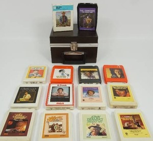 lot 12 image: Vintage 8-Track Music Cartridges with Storage Case...