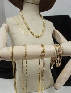 lot 50 image: Multiple Vintage Gold-Tone Necklaces and Beaded Bracelet