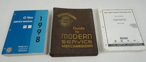 lot 262 image: Vintage Automobile Service Shop Manuals...1962-1963 Chevrolet Guide to Modern Service Merchandising Album Original, 1998 Chevy GMC G-Van Engine Shop Service Repair Manual Volume 4 of 4...