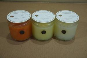 lot 55 image: 3 Aromatic Candles -Valencia Orange, Sorbet, The Smell of Spring