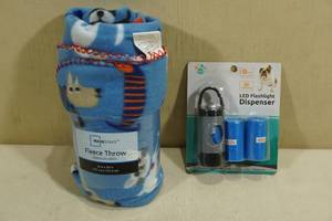 lot 190 image: Dog Theme Fleece Throw with LED Flashlight Dog Bag Dispenser