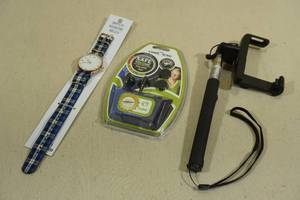 lot 193 image: Wristwatch, Earbuds, and Selfie Stick