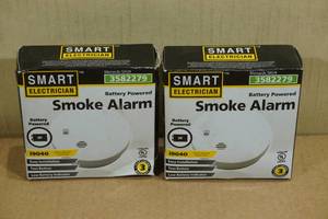 lot 207 image: 2 Smart Electrician Battery Powered Smoke Alarms