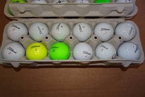 lot 1V image: 24 Assorted Golf Balls - Titleist, Top Flite, Tommy Armour, Noodle