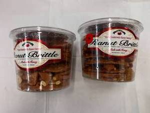 lot 99 image: 2x 38oz Tubs Olde-Fashoned Hand Dipped Peanut Brittle