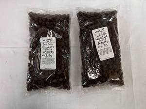 lot 132 image: 2x 2lb bags Sea Salt  Chocolate Covered Peanuts