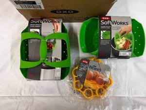 lot 280 image: 7 Piece OXO Softworks Silicone Steamers, Egg Racks