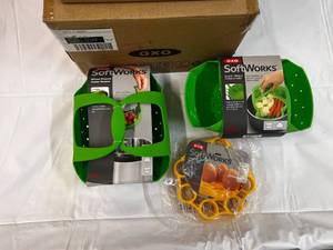 lot 281 image: 7 Piece OXO Softworks Silicone Steamers, Egg Racks