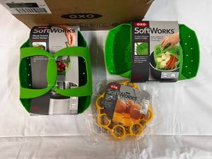 lot 283 image: 7 Piece OXO Softworks Silicone Steamers, Egg Racks