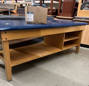 lot 73 image: S&ampW Enterprises Physical Therapy Massage Treatment Table with New Box TIDI 916213 21 x 125ft. White Premium Crepe Exam Table Barrier - In Good Condition